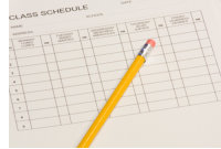 paper with a pencil on top